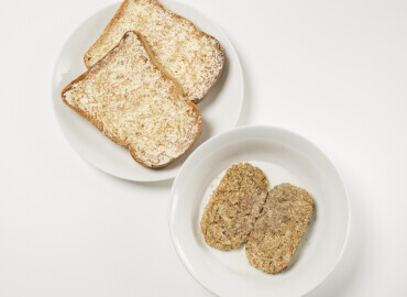 Bowl of wheat bisks and two slices of wholemeal toast with lower fat spread