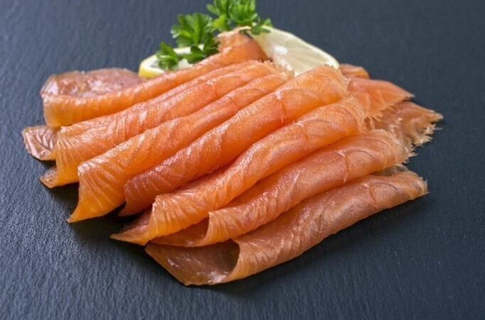 Slices of ready-to-eat cold smoked salmon