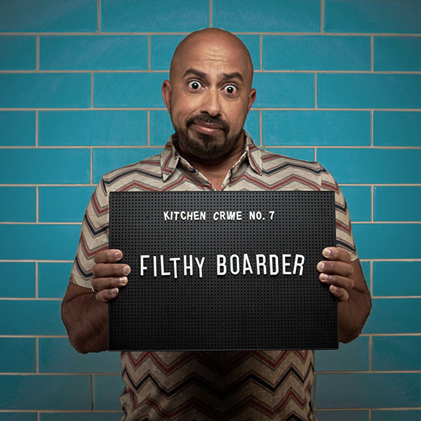 Mock mug shot photograph of a man holding a sign saying kitchen crimes number 7: filthy boarder