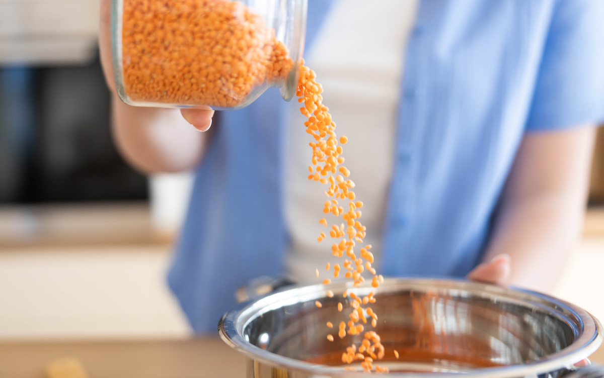 Pulses being poured into a bowl