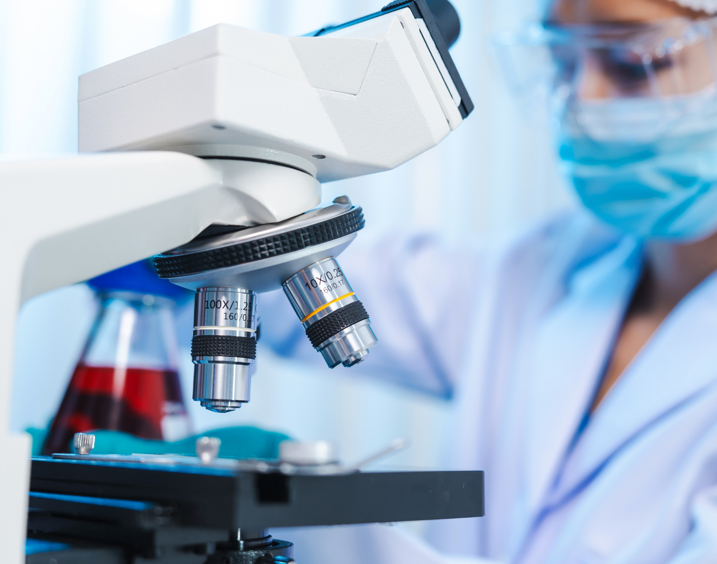 Scientist at a microscope